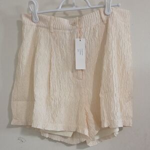 Elegant Cream Textured Women's Shorts